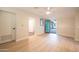 Bright bedroom features light wood floors, and a sliding glass door that leads to a patio area at 1644 W Roma Ave, Phoenix, AZ 85015