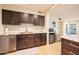 Well-equipped kitchen with modern appliances, gray cabinetry, and an undermount sink at 1644 W Roma Ave, Phoenix, AZ 85015