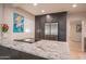 Kitchen area featuring stainless steel refrigerator, granite countertops, modern appliances and view to window with natural light at 1644 W Roma Ave, Phoenix, AZ 85015