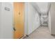 Hallway leading to unit 121 with a light colored neutral carpet at 17 W Vernon Ave # 121, Phoenix, AZ 85003