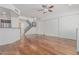 Spacious living room featuring beautiful wood floors and modern open concept design at 17 W Vernon Ave # 121, Phoenix, AZ 85003