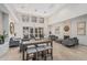 Well-lit and modern communal lounge area with high ceilings and ample seating at 17 W Vernon Ave # 121, Phoenix, AZ 85003