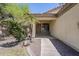 Charming front porch of a home with xeriscaped front yard and an inviting entrance at 17953 N Lettere Cir, Maricopa, AZ 85138