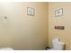 Half bathroom with toilet and decorative wall art at 18586 N Lariat Rd, Maricopa, AZ 85138