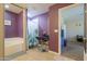 Stylish bathroom featuring elegant purple walls and tile flooring at 18586 N Lariat Rd, Maricopa, AZ 85138
