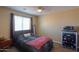 Inviting bedroom features neutral color scheme and cozy furnishings, perfect for relaxation at 18586 N Lariat Rd, Maricopa, AZ 85138
