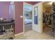 Hallway view towards main bedroom featuring an organizational closet at 18586 N Lariat Rd, Maricopa, AZ 85138