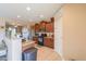 Well-lit kitchen with wood cabinets and stainless-steel appliances at 18586 N Lariat Rd, Maricopa, AZ 85138