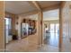 View of the entryway, living spaces, and kitchen with tile flooring in an open concept layout at 18586 N Lariat Rd, Maricopa, AZ 85138