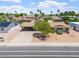 Aerial view of a home with desert landscaping, covered carport, and arched window accents at 1902 E 8Th St, Mesa, AZ 85203