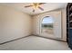 Bedroom featuring patterned carpet and arch window for lots of light at 1902 E 8Th St, Mesa, AZ 85203