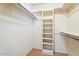 Walk-in closet with built-in shelving and storage at 1902 E 8Th St, Mesa, AZ 85203