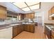Kitchen featuring tile floors, plenty of cabinet storage, and a breakfast nook at 1902 E 8Th St, Mesa, AZ 85203