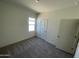 Bright bedroom with neutral walls, carpeted floors, and a window providing natural light at 2011 E Bucking Bronco Dr, San Tan Valley, AZ 85140