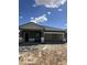 New home construction featuring a neutral color palette and open garage at 2011 E Bucking Bronco Dr, San Tan Valley, AZ 85140