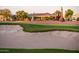 Home backing up to the golf course and meticulously maintained landscape at 22208 N San Ramon Dr, Sun City West, AZ 85375