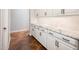 Butlers pantry with custom white cabinets and granite countertops at 22208 N San Ramon Dr, Sun City West, AZ 85375
