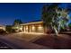 Three-car garage with long driveway, mature trees, and ample parking space for multiple vehicles at 22208 N San Ramon Dr, Sun City West, AZ 85375