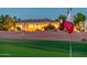 Golf course with a flag displaying 'Corto Bella Golf Club' against a serene evening backdrop at 22208 N San Ramon Dr, Sun City West, AZ 85375