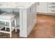 Kitchen island with seating and storage at 22208 N San Ramon Dr, Sun City West, AZ 85375
