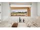 Kitchen sink with a view of the golf course at 22208 N San Ramon Dr, Sun City West, AZ 85375