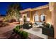 Relaxing outdoor patio featuring comfortable seating and lush greenery, perfect for entertaining guests at 22208 N San Ramon Dr, Sun City West, AZ 85375