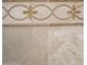 Close-up of neutral-toned patterned tile design at 22208 N San Ramon Dr, Sun City West, AZ 85375