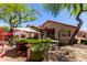 Beautiful backyard featuring a covered patio, a seating area, and a well-maintained lawn at 22232 N 48Th St, Phoenix, AZ 85054