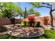 Serene backyard with patio area, umbrella, and lounge chairs, perfect for relaxation at 22232 N 48Th St, Phoenix, AZ 85054