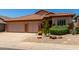 Charming home featuring a tile roof, gravel landscaping, and a spacious three-car garage at 22232 N 48Th St, Phoenix, AZ 85054