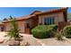 Beautiful home with a tile roof, desert landscaping, and a covered entryway at 22232 N 48Th St, Phoenix, AZ 85054