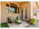 Relaxing patio area with comfortable seating, ideal for enjoying the outdoor space at 22232 N 48Th St, Phoenix, AZ 85054