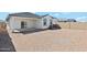 View of home's backyard featuring new build and concrete privacy walls at 22540 N Lynn St, Maricopa, AZ 85138