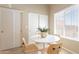 Cozy breakfast nook featuring a round table, stylish chairs, and natural light at 2320 S Forest Ave, Tempe, AZ 85282