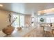 Kitchen features bar seating and an open floor plan to the home's living spaces at 2320 S Forest Ave, Tempe, AZ 85282