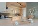 Eat-in kitchen features bar seating, stainless steel appliances, and stylish finishes at 2320 S Forest Ave, Tempe, AZ 85282