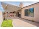 Relaxing patio with a pergola, barbecue, seating, and manicured lawn offers an ideal outdoor living space at 2320 S Forest Ave, Tempe, AZ 85282