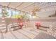 Shaded patio with pergola, bench seating, and brick flooring at 2320 S Forest Ave, Tempe, AZ 85282