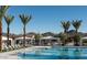 Community pool featuring lounge seating and mountain views at 2463 W Rowel Rd, Phoenix, AZ 85085