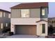Charming two-story home featuring a two-car garage and a welcoming entrance at 2486 W Rowel Rd, Phoenix, AZ 85085