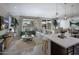 Bright living room featuring stylish decor, large windows, and open floor plan at 2486 W Rowel Rd, Phoenix, AZ 85085