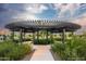 Tranquil pergola surrounded by lush greenery and walking paths at 2486 W Rowel Rd, Phoenix, AZ 85085