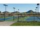 Community tennis courts set against a backdrop of scenic mountains at 2486 W Rowel Rd, Phoenix, AZ 85085