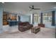 Open-concept living area flowing into the kitchen, perfect for entertaining and everyday living at 26017 W Maple Dr, Buckeye, AZ 85396