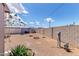 Wide shot of backyard with desert landscaping and block wall for privacy at 2700 E Allred Ave # R87, Mesa, AZ 85204