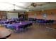 The expansive banquet hall is perfect for large gatherings, featuring ample seating and a stage for events at 2700 E Allred Ave # R87, Mesa, AZ 85204