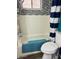 Bathroom with shower/tub combo, nice striped shower curtain, and subway tile at 2700 E Allred Ave # R87, Mesa, AZ 85204