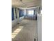 Neutral bedroom features carpet, blue blinds, and a comfortable bed at 2700 E Allred Ave # R87, Mesa, AZ 85204
