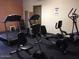 Fitness center equipped with treadmills, stationary bikes, and other exercise machines at 2700 E Allred Ave # R87, Mesa, AZ 85204