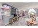 Open-concept living room features wood floors and lots of natural light at 2700 E Allred Ave # R87, Mesa, AZ 85204